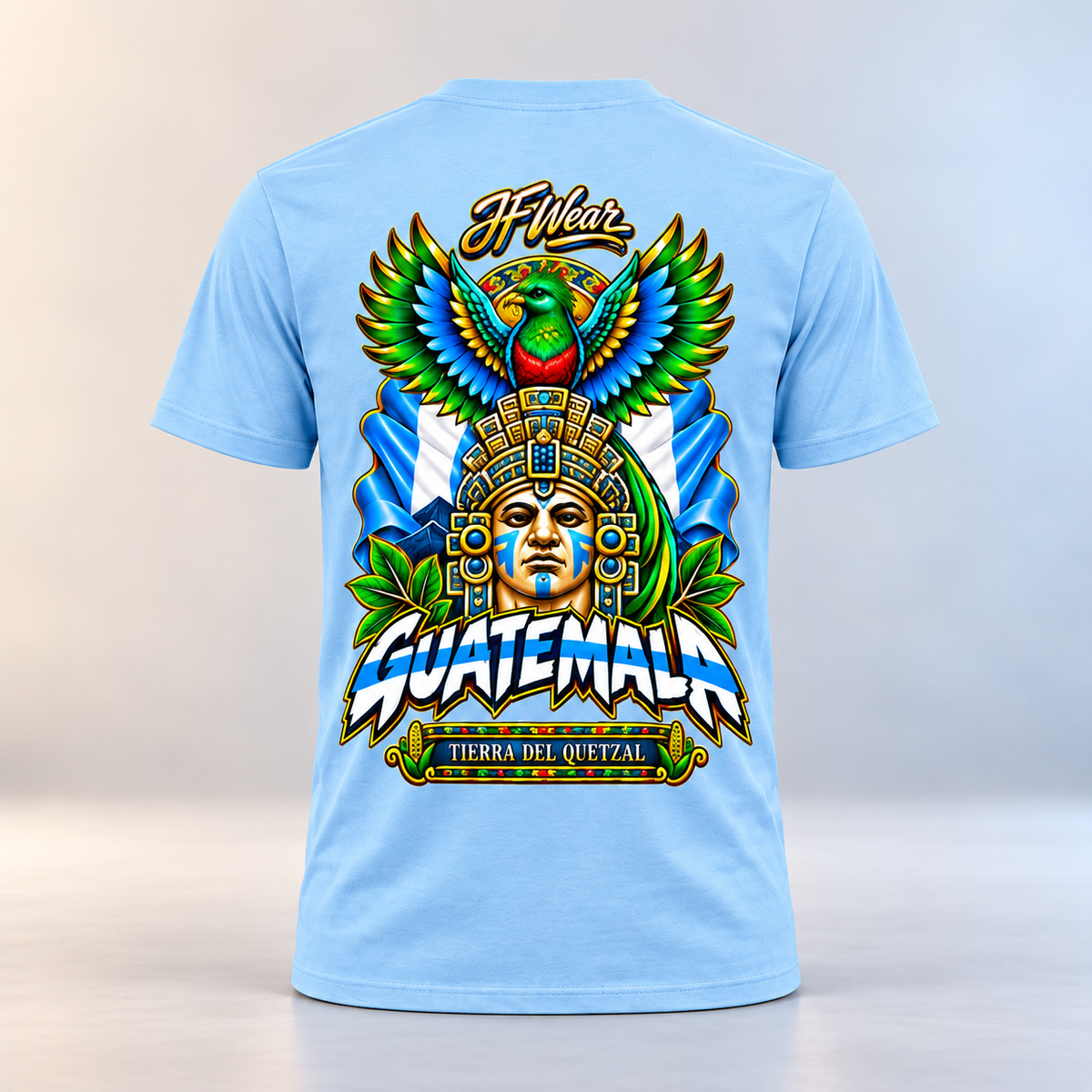 light-blue JF Wear  Guatemala graphic t-shirt featuring colorful Guatemala headdress and quetzal bird, back view.