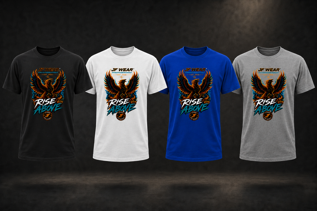 Four short-sleeve graphic T-shirts shown side by side on a dark studio background: black, white, blue, and heather gray. Each shirt features a large eagle graphic with the text 'RISE ABOVE' and a small 'JE WEAR' logo above the print.