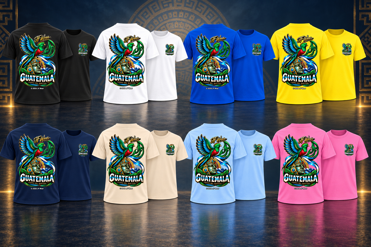 Twelve short-sleeve graphic T-shirts arranged in two rows on a dark reflective surface. Each shirt shows a large colorful parrot illustration with the word "GUATEMALA" and smaller text below.